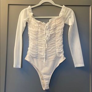 SOLD ! White lace up bodysuit - rushed white
